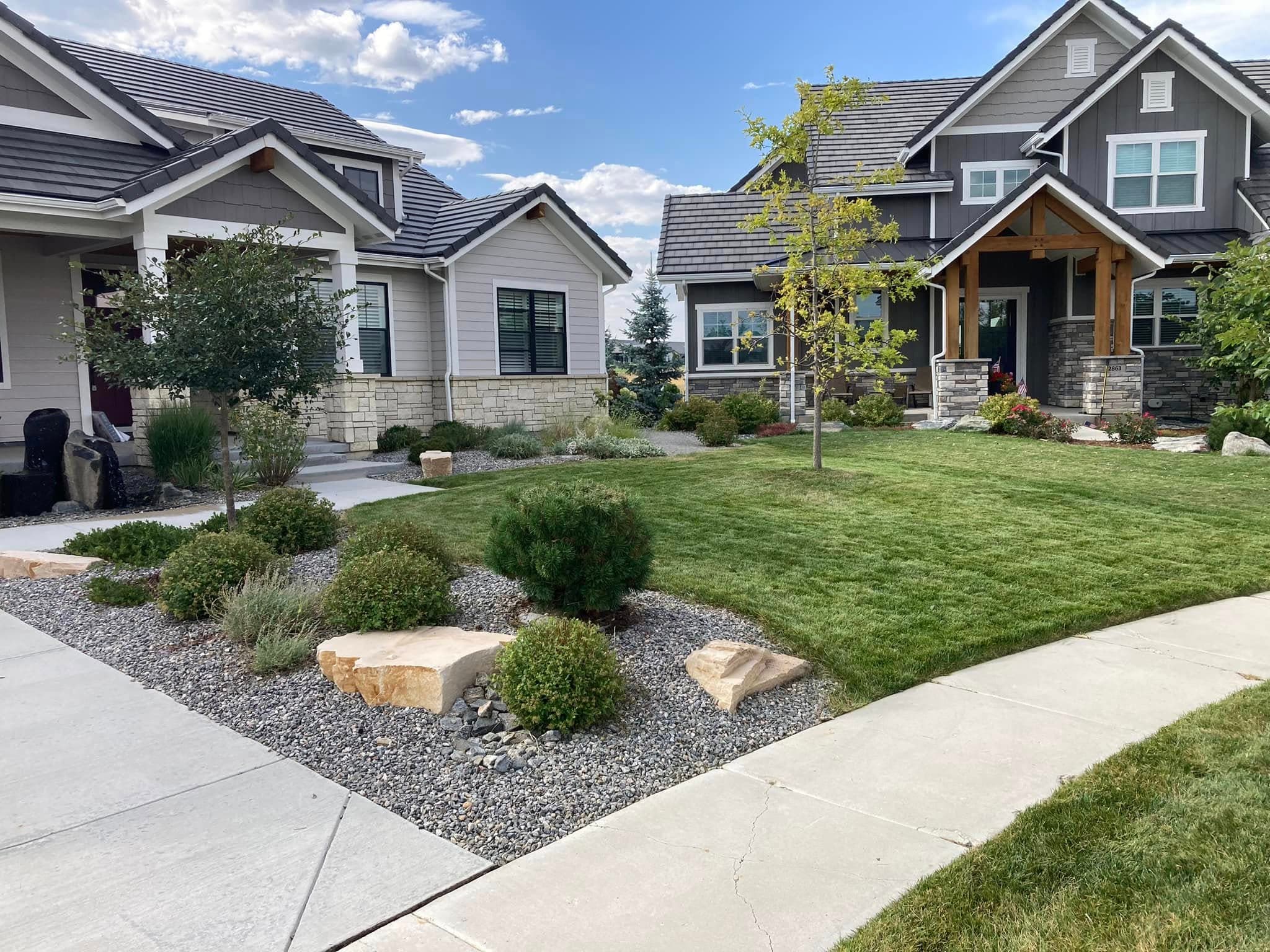 Two homes with professionally landscaped front yards